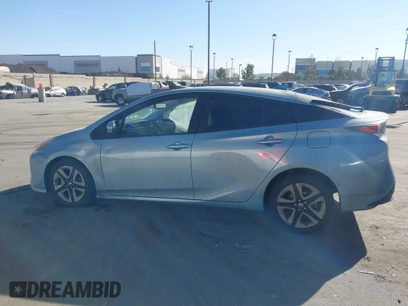 2016 Toyota Prius Four with VIN JTDKARFU8G3510996, listed as a IAAI auction lot 41406304 with 118,526 mi miles and . Bid and sale history available at DreamBid. Image 14.