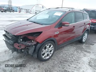 2014 Ford Escape Titanium with VIN 1FMCU9J94EUA13509, listed as a IAAI auction lot 41291232 with 174,303 mi miles. Bid and sale history available at carsss.com. Image 2.