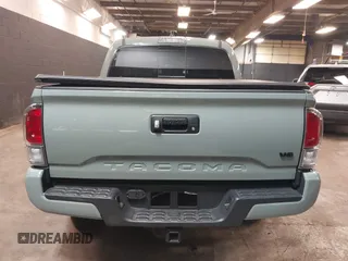 2023 Toyota Tacoma 4WD SR with VIN 3TMCZ5ANXPM607489, listed as a IAAI auction lot 41605018 with 15,229 mi miles. Bid and sale history available at carsss.com. Image 16.