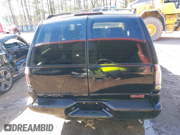 2000 GMC Denali with VIN 1GKEK13R1YR129862, listed as a IAAI auction lot 41833054 with 223,811 mi miles. Bid and sale history available at carsss.com. Image 16.