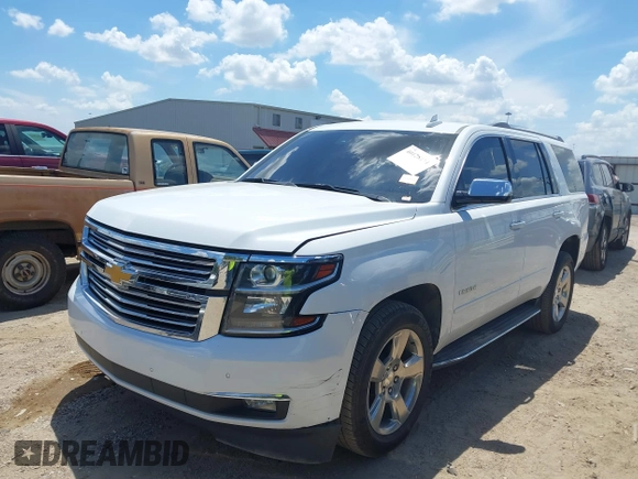 2020 Chevrolet Tahoe LTZ with VIN 1GNSCCKCXLR215899, listed as a IAAI auction lot 40128171 with 109,541 mi miles and . Bid and sale history available at DreamBid. Image 18.