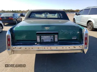 1992 Cadillac Brougham z VIN 1G6DW547XNR703499, wystawiony jako Copart lot #66709103 z przebiegiem Nie podano mil oraz Nie do naprawy. Historia ofert i sprzedaży dostępna na DreamBid. Obrazek 6.