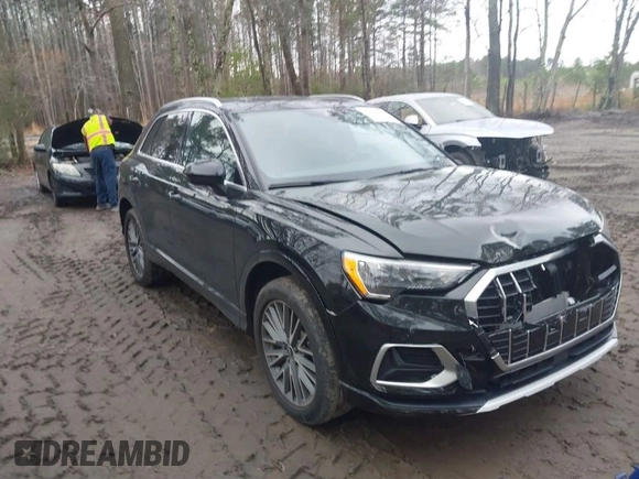2021 Audi Q3 Premium with VIN WA1AUCF34M1148531, listed as a IAAI auction lot 41815286 with 31,934 mi miles and . Bid and sale history available at DreamBid. Image 1.