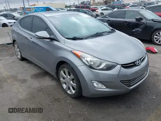 2013 Hyundai Elantra GLS z VIN KMHDH4AE2DU627675, wystawiony jako IAAI lot #41523186 z przebiegiem 90 868 mil mil oraz . Historia ofert i sprzedaży dostępna na DreamBid. Obrazek 1.