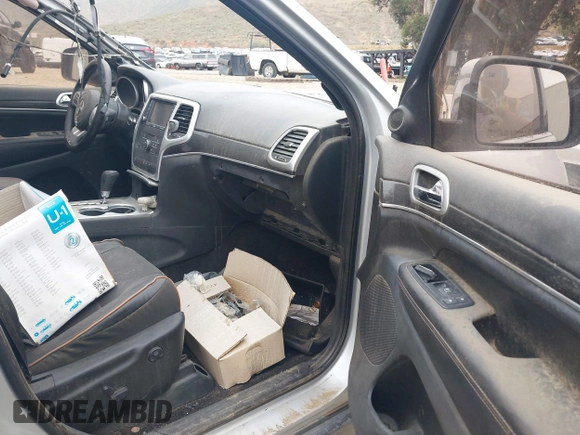 2011 Jeep Grand Cherokee Laredo with VIN 1J4RS4GG1BC646719, listed as a IAAI auction lot 42056300 with Not Provided miles and . Bid and sale history available at DreamBid. Image 5.