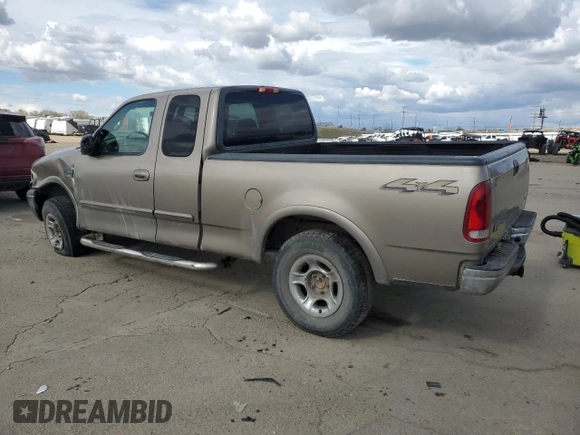2001 Ford F-150 XL with VIN 1FTRX18L01KE64063, listed as a Copart auction lot 51500775 with 326,070 mi miles and Salvage title. Bid and sale history available at DreamBid. Image 2.