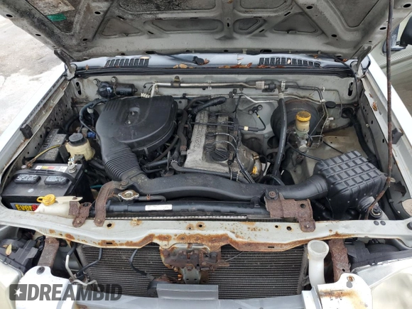 2002 Nissan Frontier XE with VIN 1N6DD26S22C374943, listed as a Copart auction lot 46813415 with 232,381 mi miles and Salvage title. Bid and sale history available at DreamBid. Image 11.
