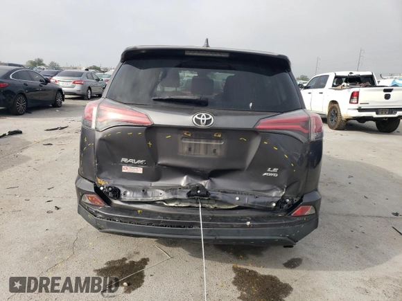 2018 Toyota RAV4 LE with VIN JTMBFREV8JJ260321, listed as a Copart auction lot 50588215 with 208,236 mi miles and Salvage title. Bid and sale history available at DreamBid. Image 6.