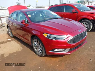 2017 Ford Fusion Titanium z VIN 3FA6P0K91HR252083, wystawiony jako IAAI lot #42039614 z przebiegiem 61 941 mil mil oraz . Historia ofert i sprzedaży dostępna na DreamBid. Obrazek 1.