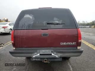 1999 Chevrolet Suburban with VIN 1GNFK16R7XJ402741, listed as a Copart auction lot 73283404 with 143,943 mi miles and Salvage Title. Bid and sale history available at carsss.com. Image 6.