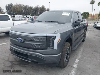 2023 Ford F-150 Lightning Pro with VIN 1FTVW1EL8PWG48559, listed as a IAAI auction lot 42033123 with 8,845 mi miles. Bid and sale history available at carsss.com. Image 21.