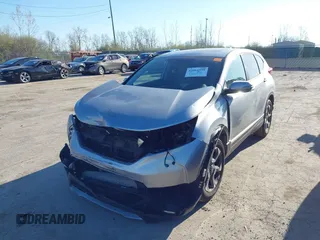 2018 Honda CR-V EX with VIN 7FARW2H56JE097214, listed as a IAAI auction lot 42061999 with 74,862 mi miles and . Bid and sale history available at DreamBid. Image 6.