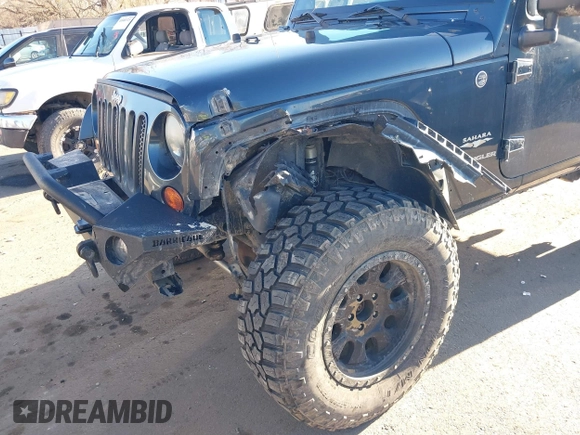 2008 Jeep Wrangler Sahara with VIN 1J4FA54108L543764, listed as a IAAI auction lot 41867734 with 186,145 mi miles and . Bid and sale history available at DreamBid. Image 6.