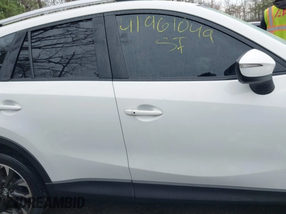 2016 Mazda CX-5 Grand Touring with VIN JM3KE4DY3G0838204, listed as a IAAI auction lot 41961049 with 98,918 mi miles and . Bid and sale history available at carsss.com. Image 13.