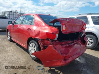 2009 Toyota Corolla with VIN 1NXBU40E19Z003510, listed as a IAAI auction lot 42061161 with 136,846 mi miles. Bid and sale history available at carsss.com. Image 3.