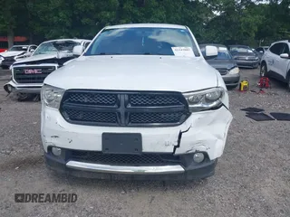 2013 Dodge Durango Special Service z VIN 1C4RDJFG4DC675358, wystawiony jako IAAI lot #42443882 z przebiegiem 94 889 mil mil oraz . Historia ofert i sprzedaży dostępna na DreamBid. Obrazek 12.