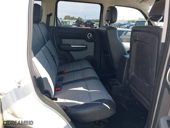 2010 Dodge Nitro SXT with VIN 1D4PU5GK3AW115958, listed as a IAAI auction lot 40357456 with 162,548 mi miles. Bid and sale history available at carsss.com. Image 8.