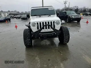 2020 Jeep Wrangler Unlimited Sport with VIN 1C4HJXDG4LW240492, listed as a Copart auction lot 43196635 with 56,602 mi miles and Clean title. Bid and sale history available at DreamBid. Image 11.
