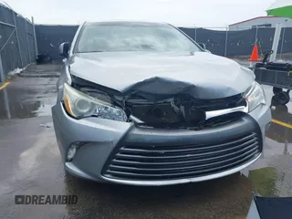 2015 Toyota Camry XLE with VIN 4T4BF1FK4FR483890, listed as a IAAI auction lot 42088503 with 189,058 mi miles and . Bid and sale history available at DreamBid. Image 6.