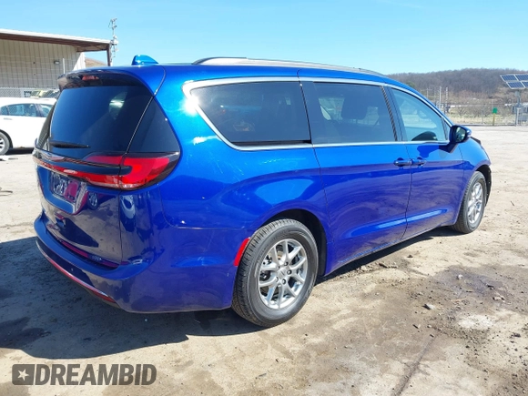 2021 Chrysler Pacifica Touring with VIN 2C4RC1FG5MR511546, listed as a IAAI auction lot 41882085 with 85,635 mi miles and . Bid and sale history available at DreamBid. Image 4.