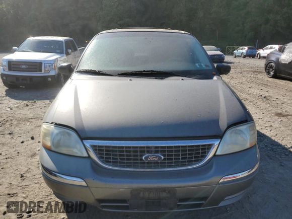 2003 Ford Windstar SE z VIN 2FMZA52433BB25493, wystawiony jako Copart lot #69988344 z przebiegiem Nie podano mil oraz Czysty tytuł • Clean title. Historia ofert i sprzedaży dostępna na DreamBid. Obrazek 5.