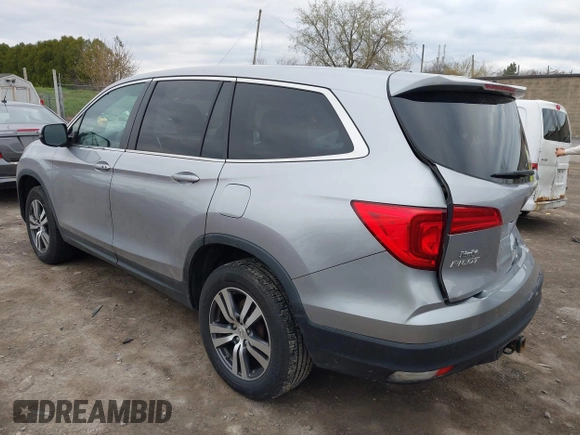 2017 Honda Pilot EX-L with VIN 5FNYF6H5XHB014067, listed as a IAAI auction lot 42083742 with 143,043 mi miles and . Bid and sale history available at DreamBid. Image 3.