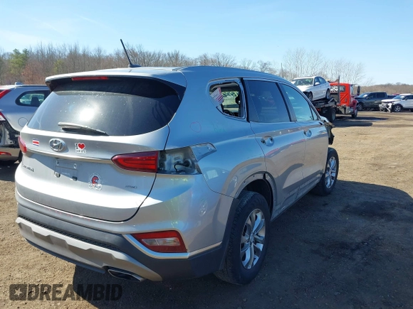 2020 Hyundai Santa Fe SE z VIN 5NMS2CAD7LH269302, wystawiony jako IAAI lot #41833303 z przebiegiem 70 665 mil mil oraz . Historia ofert i sprzedaży dostępna na DreamBid. Obrazek 19.