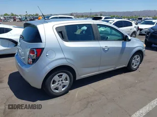 2014 Chevrolet Sonic LS with VIN 1G1JA6SH1E4135729, listed as a IAAI auction lot 42169273 with 74,969 mi miles and . Bid and sale history available at DreamBid. Image 4.