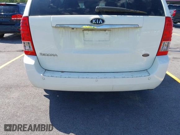 2012 Kia Sedona LX with VIN KNDMG4C71C6447550, listed as a IAAI auction lot 42190357 with 161,960 mi miles. Bid and sale history available at carsss.com. Image 13.