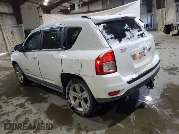2011 Jeep Compass with VIN 1J4NT1FA1BD137635, listed as a Copart auction lot 41784705 with 182,932 mi miles and Clean Title. Bid and sale history available at carsss.com. Image 2.
