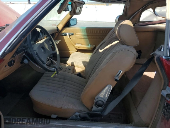 1985 Mercedes-Benz SL with VIN WDBBA45C9FA017476, listed as a Copart auction lot 74177774 with 135,805 mi miles and Salvage title. Bid and sale history available at DreamBid. Image 7.