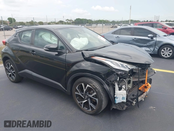 2021 Toyota C-HR LE z VIN NMTKHMBX3MR127202, wystawiony jako IAAI lot #42188312 z przebiegiem 54 029 mil mil oraz . Historia ofert i sprzedaży dostępna na DreamBid. Obrazek 1.