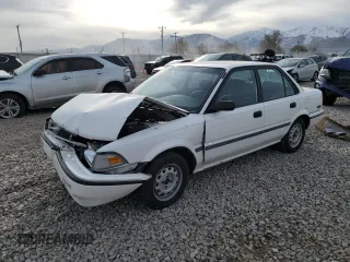 1991 Toyota Corolla z VIN 1NXAE94A7MZ170847, wystawiony jako Copart lot #82136244 z przebiegiem 194 069 mil mil oraz Szkoda całkowita • Salvage title. Historia ofert i sprzedaży dostępna na DreamBid. Obrazek 1.