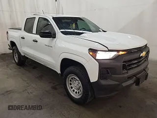 2023 Chevrolet Colorado 4WD Work Truck with VIN 1GCGTBEC5P1199989, listed as a IAAI auction lot 42674419 with 14,286 mi miles and . Bid and sale history available at DreamBid. Image 3.