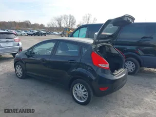 2011 Ford Fiesta SES with VIN 3FADP4FJ8BM201669, listed as a IAAI auction lot 40745834 with 166,802 mi miles. Bid and sale history available at carsss.com. Image 3.