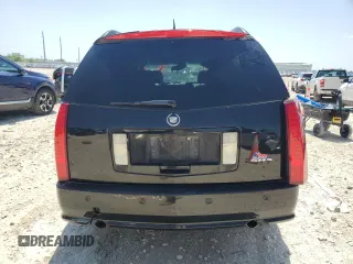 2009 Cadillac SRX RWD z VIN 1GYEE637090151656, wystawiony jako Copart lot #56118155 z przebiegiem Nie podano mil oraz Szkoda całkowita • Salvage title. Historia ofert i sprzedaży dostępna na DreamBid. Obrazek 6.