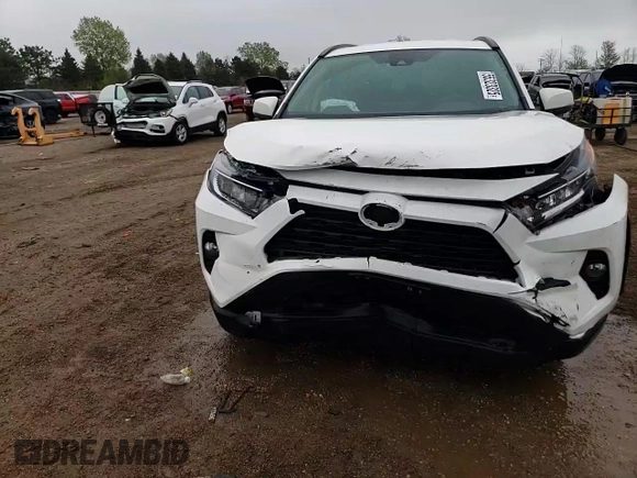 2021 Toyota RAV4 XLE with VIN 2T3P1RFV6MW228427, listed as a Copart auction lot 55323325 with 54,002 mi miles and Salvage title. Bid and sale history available at DreamBid. Image 13.