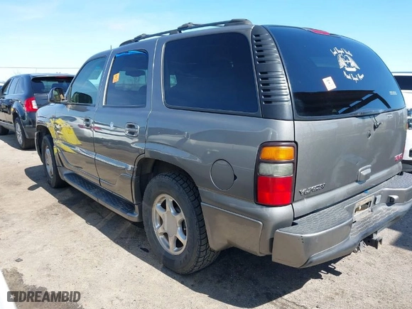 2005 GMC Yukon Denali with VIN 1GKEK63U35J149963, listed as a IAAI auction lot 41829530 with 243,575 mi miles. Bid and sale history available at carsss.com. Image 3.