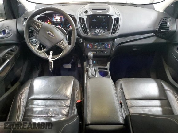 2017 Ford Escape Titanium with VIN 1FMCU0JD6HUE70200, listed as a Copart auction lot 49141595 with 92,159 mi miles and Salvage Title. Bid and sale history available at DreamBid. Image 8.