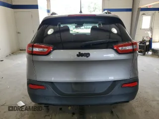 2017 Jeep Cherokee Altitude with VIN 1C4PJLABXHW586048, listed as a Copart auction lot 62674745 with 106,334 mi miles and Salvage title. Bid and sale history available at DreamBid. Image 6.