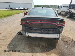 2016 Dodge Charger R/T with VIN 2C3CDXCT4GH303356, listed as a Copart auction lot 59140015 with 128,049 mi miles and Salvage title. Bid and sale history available at DreamBid. Image 6.