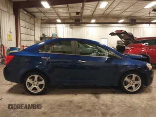 2012 Chevrolet Sonic LTZ z VIN 1G1JE5SB4C4214450, wystawiony jako IAAI lot #42207345 z przebiegiem 120 152 mil mil oraz . Historia ofert i sprzedaży dostępna na DreamBid. Obrazek 14.