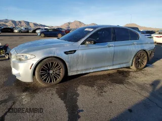 2013 BMW M5 with VIN WBSFV9C58DD096751, listed as a Copart auction lot 85451614 with 76,576 mi miles and Salvage Title. Bid and sale history available at carsss.com. Image 1.