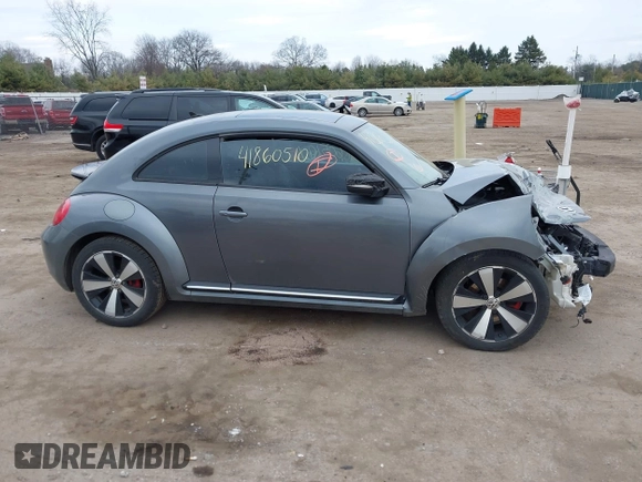 2012 Volkswagen Beetle with VIN 3VWV67AT0CM663718, listed as a IAAI auction lot 41860510 with 99,932 mi miles and . Bid and sale history available at DreamBid. Image 14.