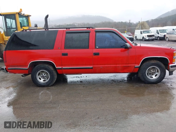 1999 Chevrolet Suburban with VIN 3GNEC16R7XG248641, listed as a IAAI auction lot 41964302 with 183,384 mi miles. Bid and sale history available at carsss.com. Image 6.