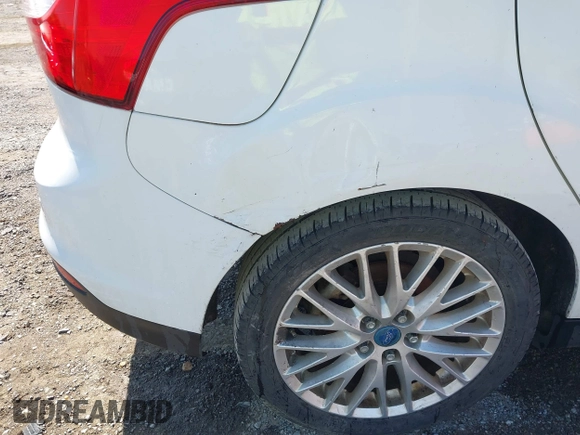 2012 Ford Focus SEL with VIN 1FAHP3M21CL413436, listed as a IAAI auction lot 42011706 with 392,754 mi miles. Bid and sale history available at carsss.com. Image 6.