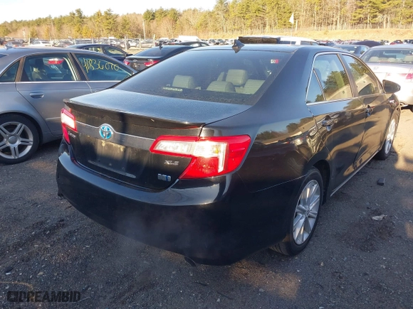 2012 Toyota Camry Hybrid XLE with VIN 4T1BD1FK3CU030064, listed as a IAAI auction lot 41872634 with 373,897 mi miles. Bid and sale history available at carsss.com. Image 4.