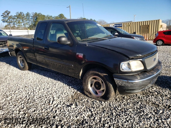 1999 Ford F-150 XL with VIN 1FTRX17L9XNA53124, listed as a Copart auction lot 49214405 with Not Provided miles and Salvage Title. Bid and sale history available at carsss.com. Image 4.