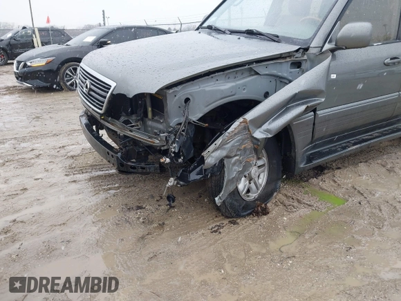 2000 Lexus LX 470 z VIN JT6HT00W8Y0092556, wystawiony jako IAAI lot #41727615 z przebiegiem 156 262 mil mil oraz . Historia ofert i sprzedaży dostępna na DreamBid. Obrazek 6.