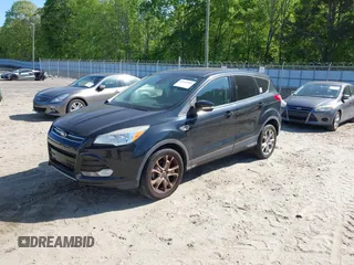 2013 Ford Escape SEL with VIN 1FMCU0HX3DUC67212, listed as a IAAI auction lot 42045568 with 142,382 mi miles. Bid and sale history available at carsss.com. Image 2.